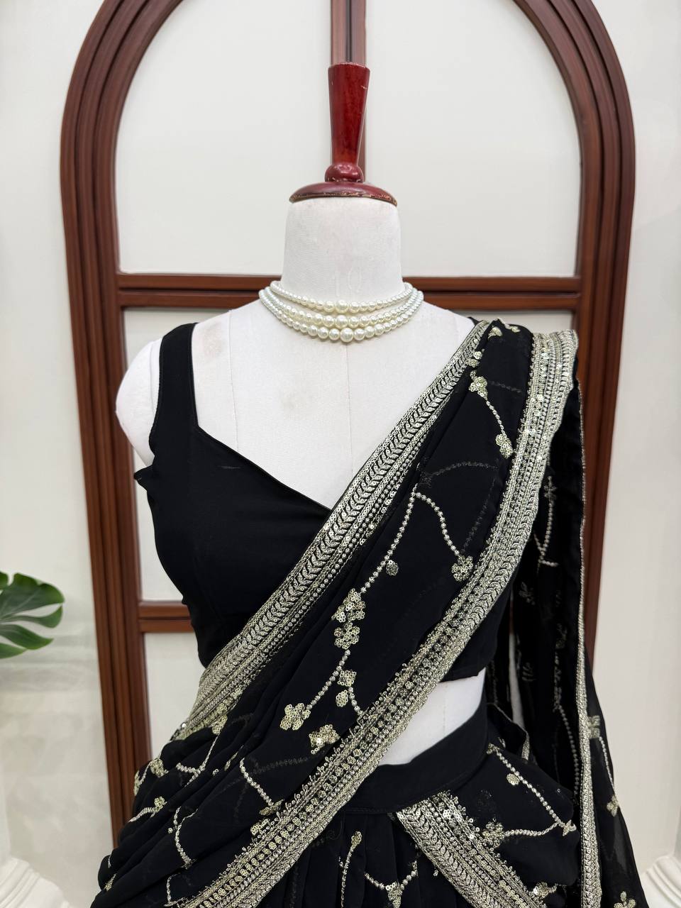 Midnight Black Georgette Lehenga Choli Adorned with Delicate Silver Floral Vine Embroidery and Scalloped Borders